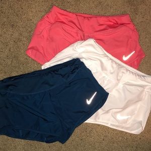 Nike shorts. Only wore the white ones once.